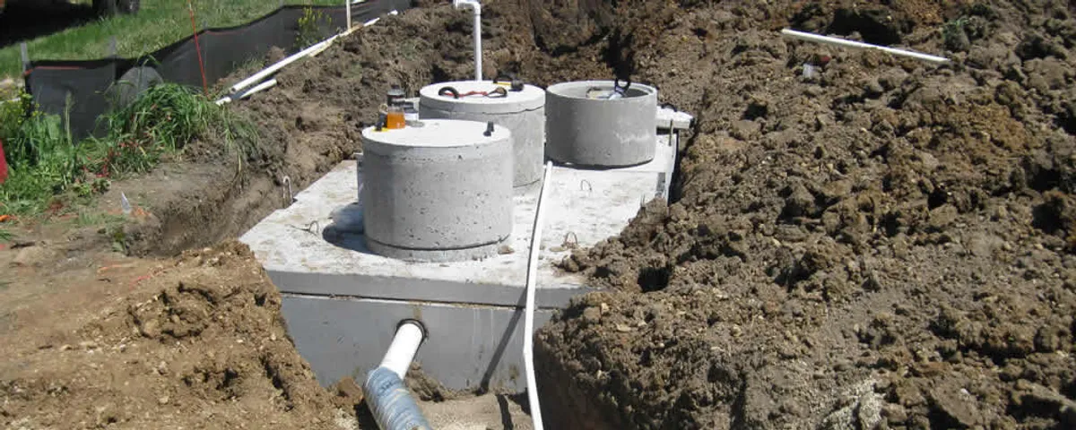 Septic system repair and installation site with tank access ports in Oak Park, IL